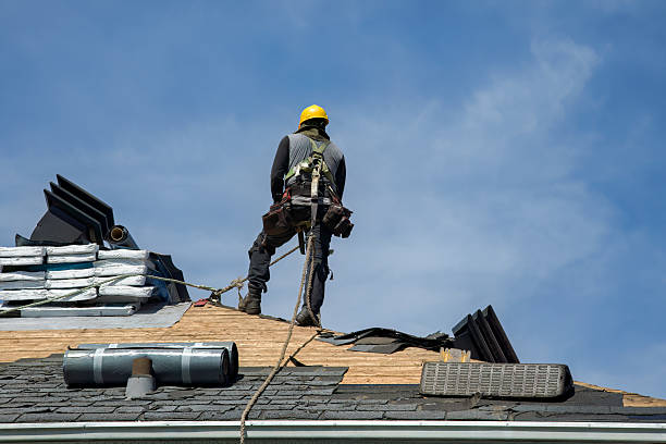 Professional Gutter Installation technician working in East Lansing, MI
